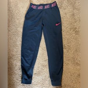 Girls Nike dri-fit sweats size large, navy blue with pink Nike on waistband